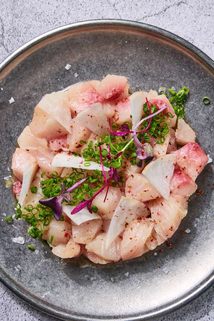 White fish crudo with herbs